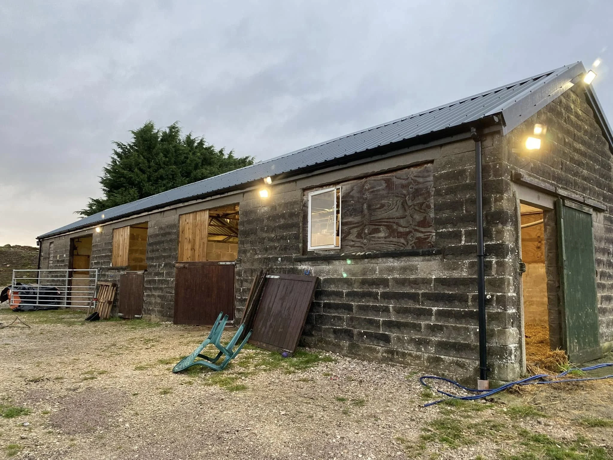 Exterior outbuilding with wall lights