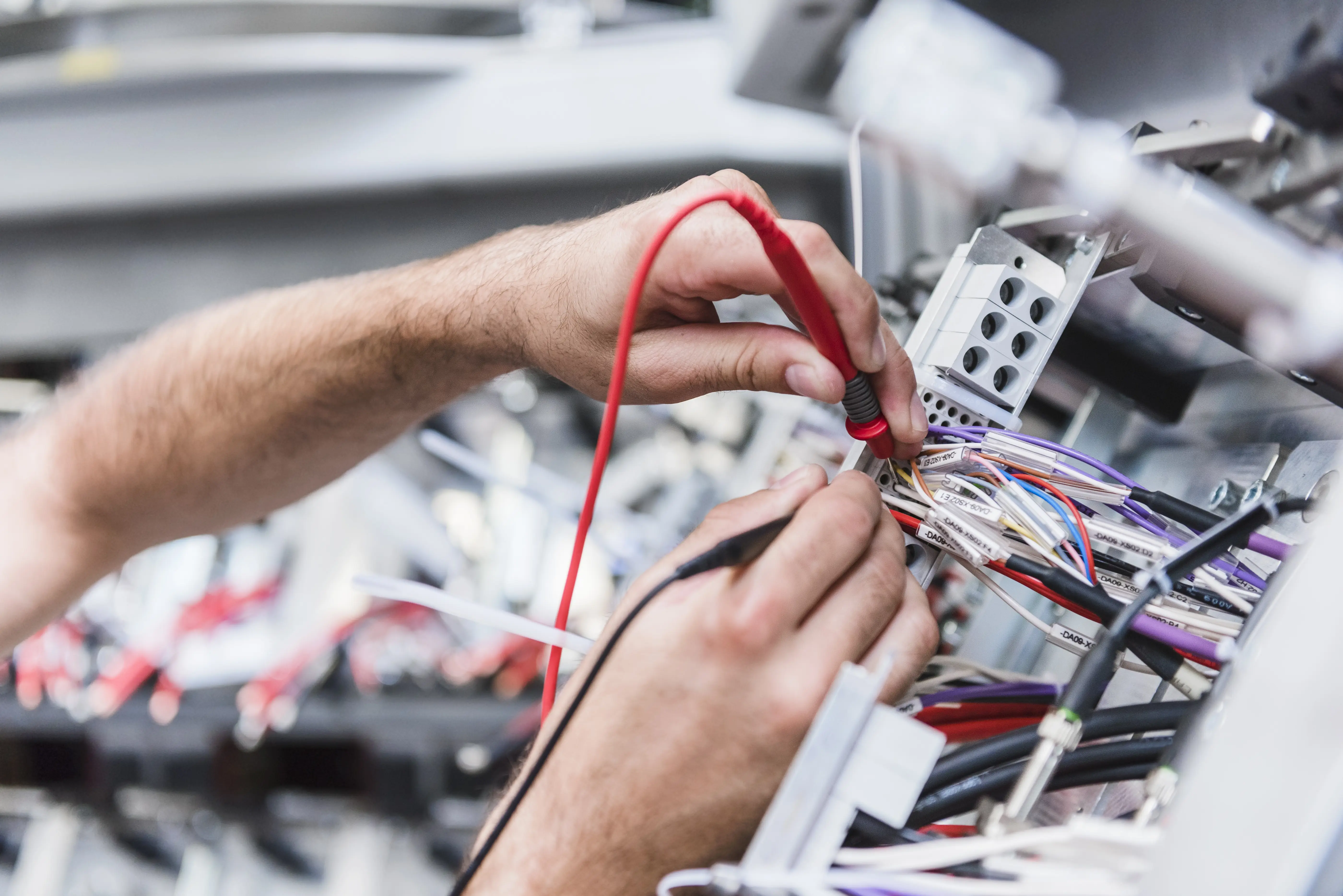 Hands Testing Wires